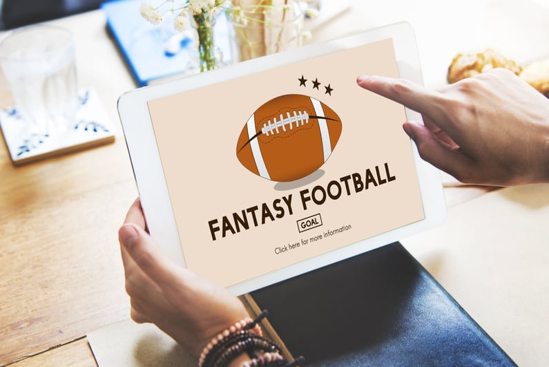 A tablet with a fantasy football sign