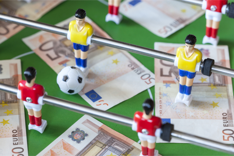 Concept about money spending in football (soccer), sports betting and manipulated fixed matches