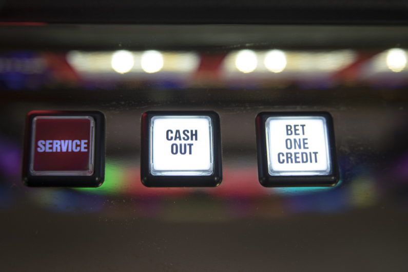 Bet one credit, cash out and service buttons on slot machine