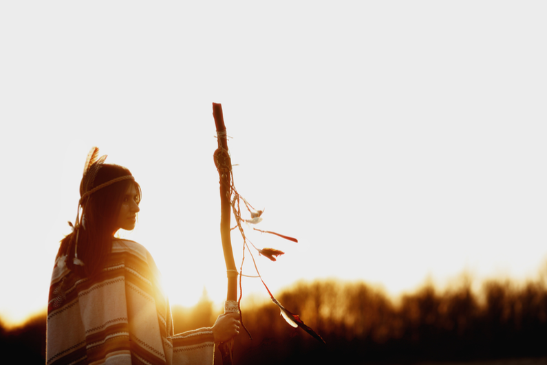 Native American woman with pikestaff