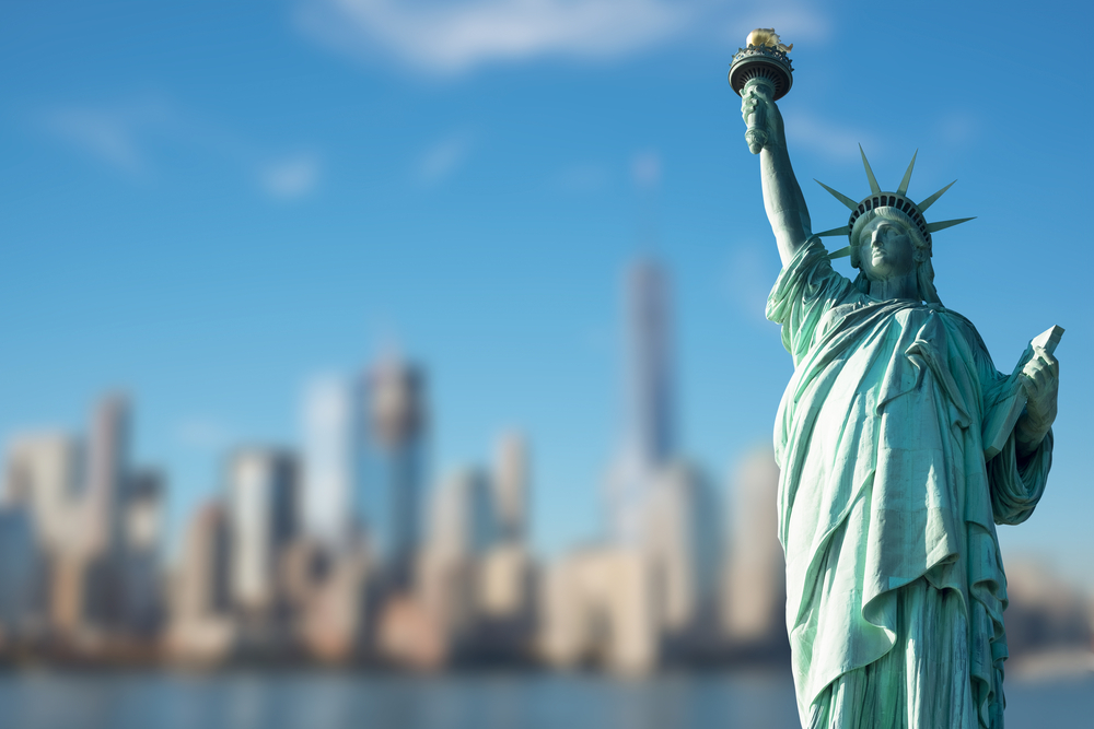 Statue of Liberty against blurred New York background