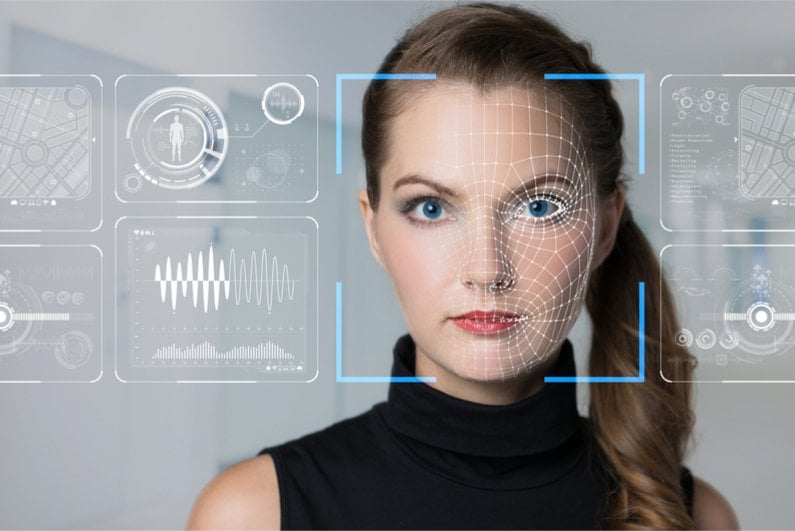 facial recognition diagrams superimposed on woman's face