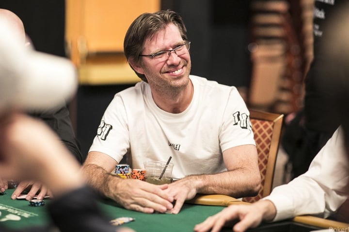 Poker pro player Layne Flack at a poker tournament table